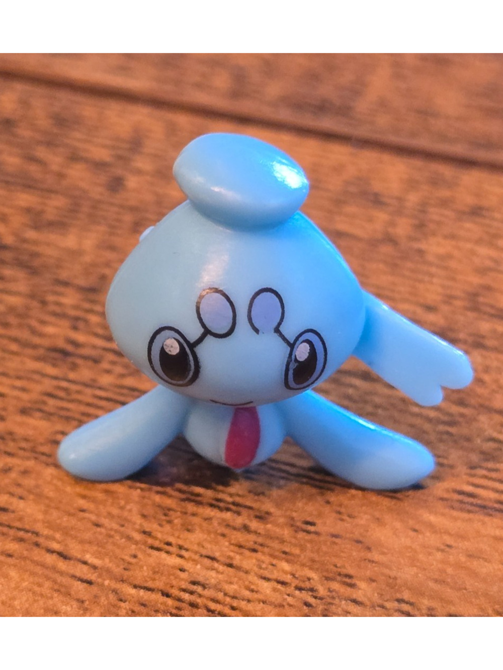 1-inch Phione mini-figure from the Pokémon franchise
